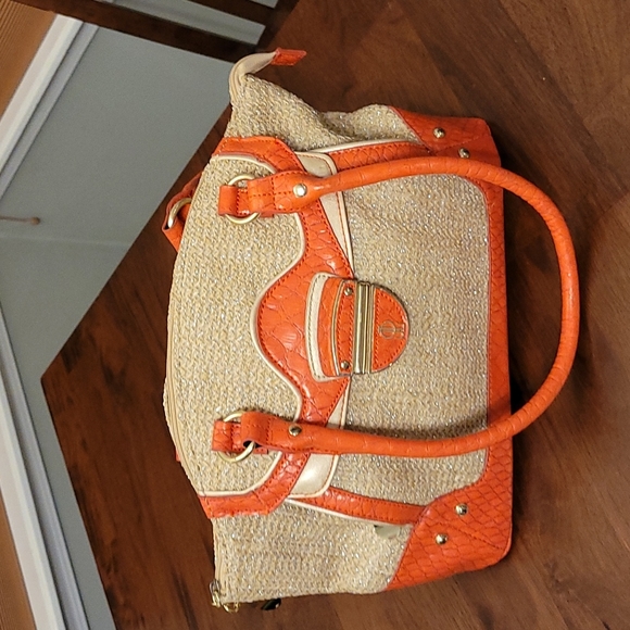 Jennifer Lopez Handbags - JLO purse. Beige has silver strings, faux orange leather.